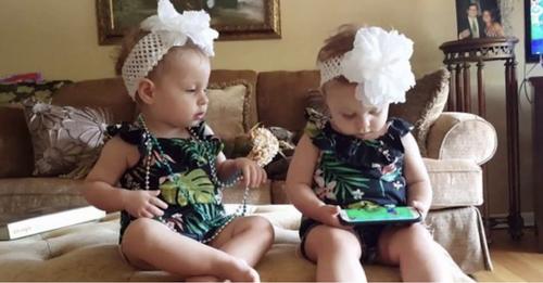 Funny reaction of twin babies when the phone rings. They are really cool